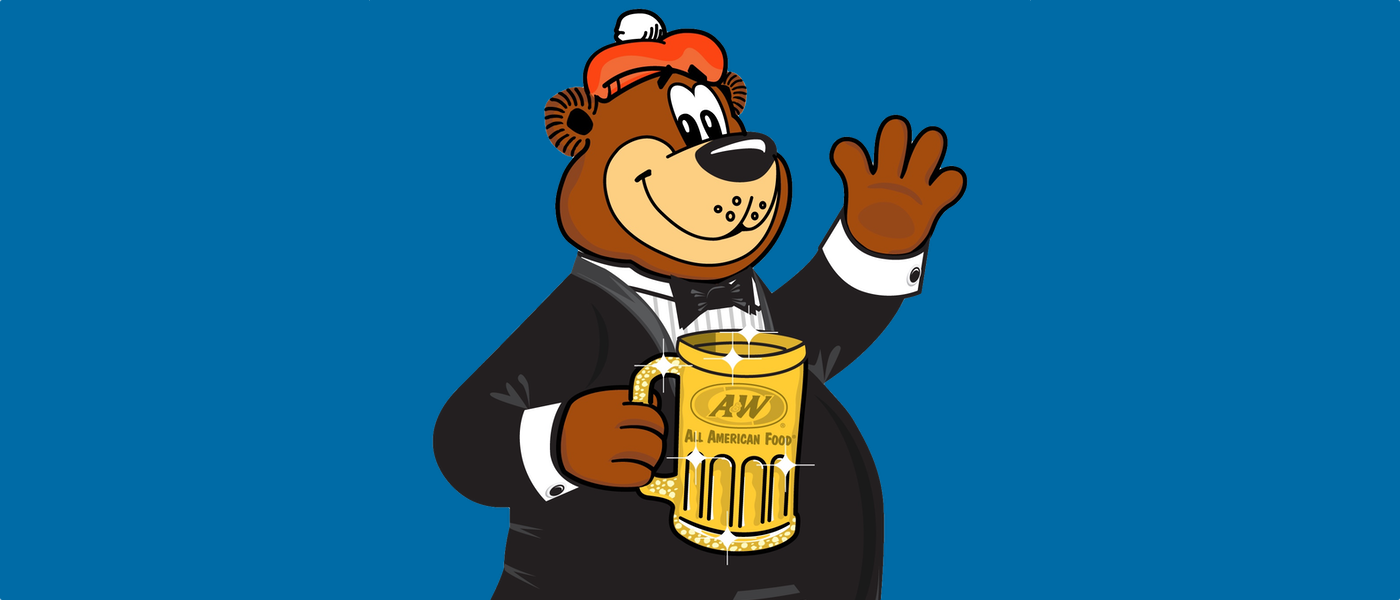 Rooty the Great Root Bear in a tuxedo holding a golden mug